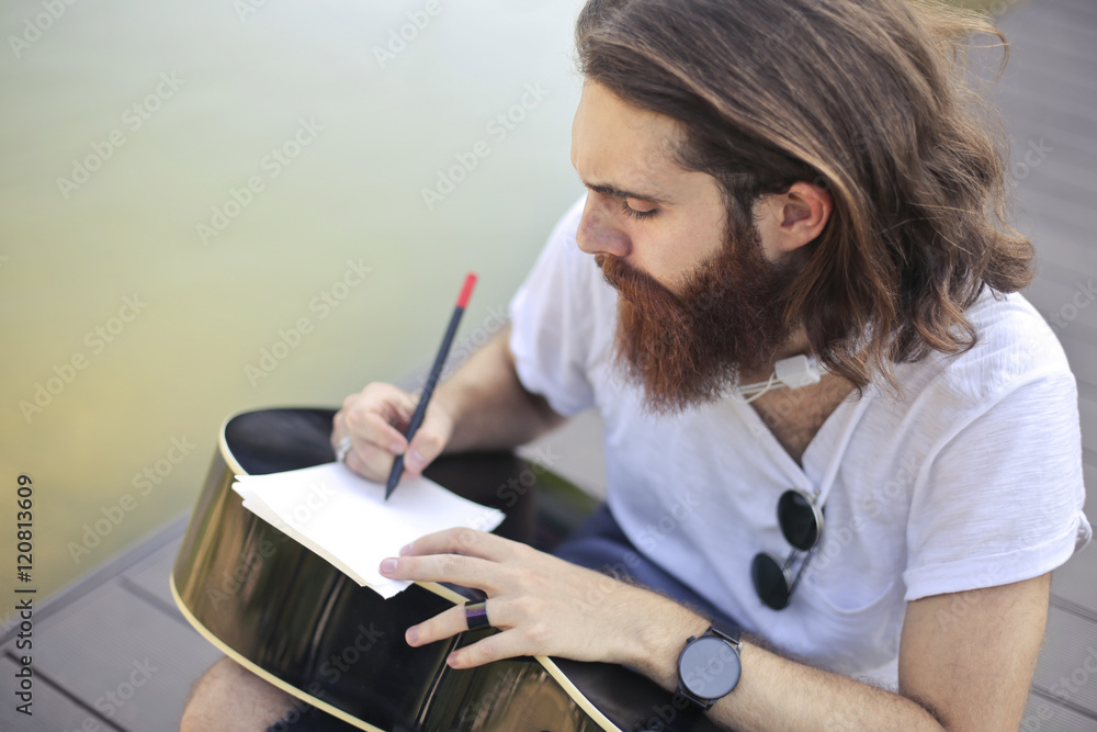 Fototapeta premium Guitarist composing new music