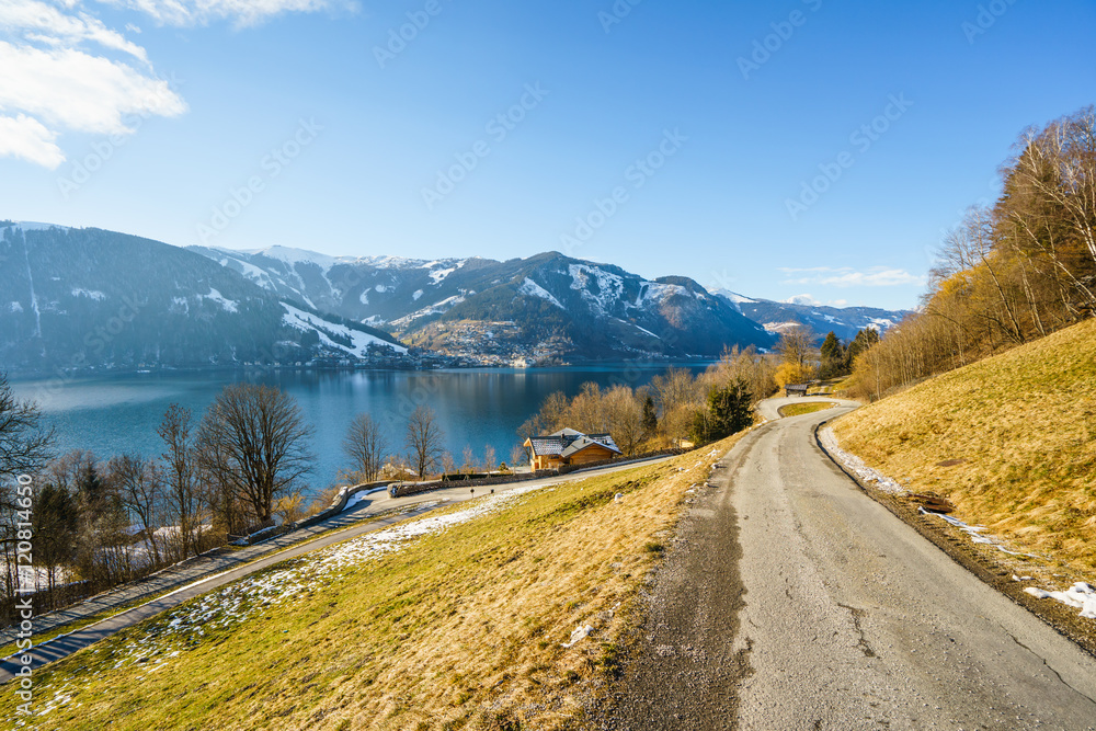 Scenic view on sunny mountain landscape with winter lake in Zell