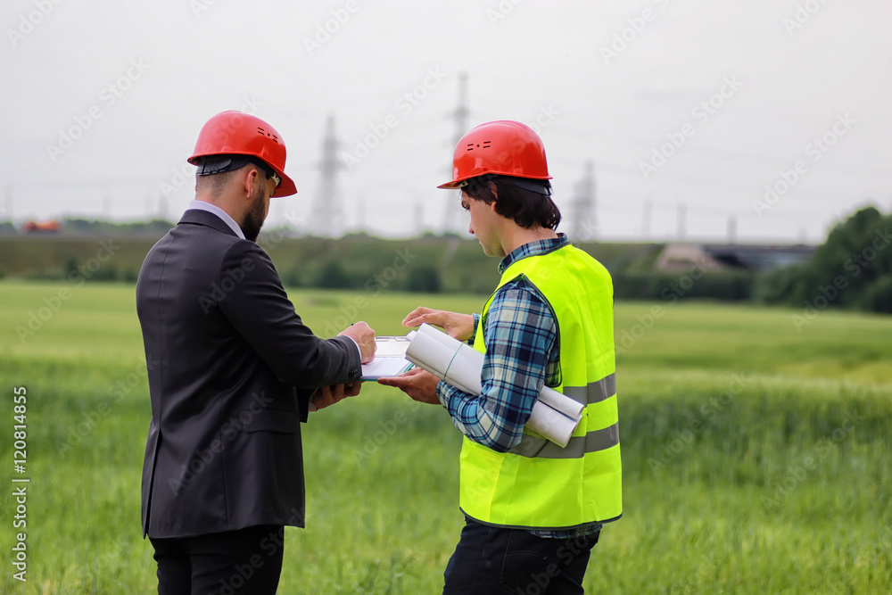 construction two man in the field construction two man in the field