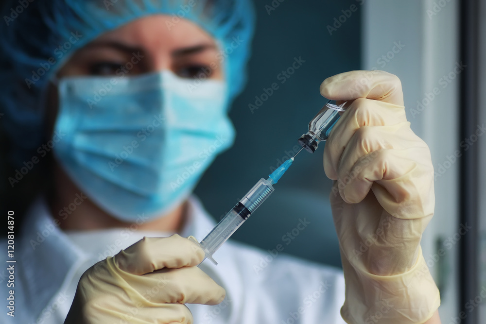 nurse hands holding syringe and ampoule nurse hands holding syringe and ampoule
