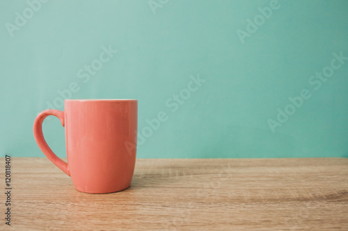 a mug on a white wooden table