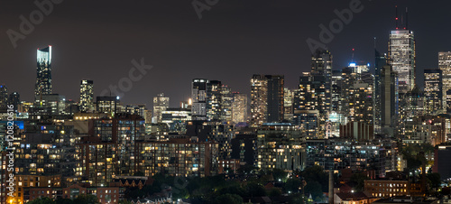 Wallpaper Mural Urban lighted landscape of Toronto.   A balcony view of  lighted streets, parks, buildings and office towers on a hot & humid August night in capitol of Ontario, Canada. Torontodigital.ca