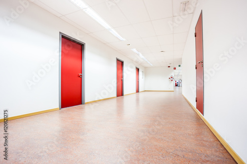 corridor whit red doors