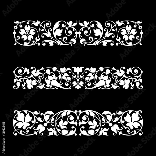 Calligraphic ornaments isolated on black background