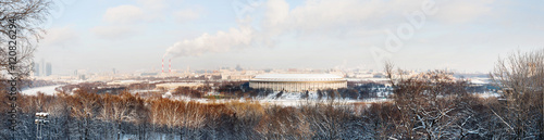 Panorama view on Luzhniki stadium and Sparrow Hills from observation deck near Moscow State Univercity (MSU). Winter sunny day. Moscow, Russia.