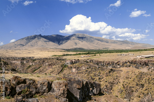 View of the mount Aragats from the opposite side of the canyon Kasakh river in autumn sunny day  