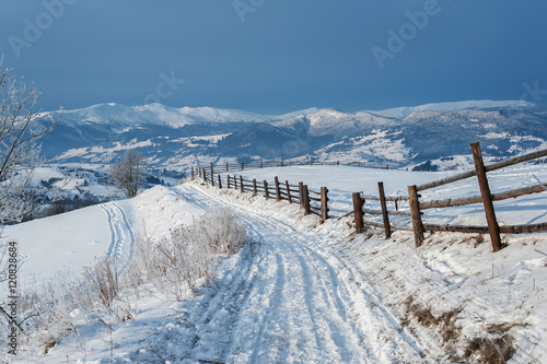 rural winter road covered by snow. natural background