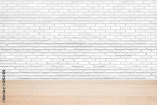 wooden table with brick wall background