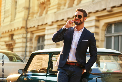 Young businessman at a car © Spectral-Design