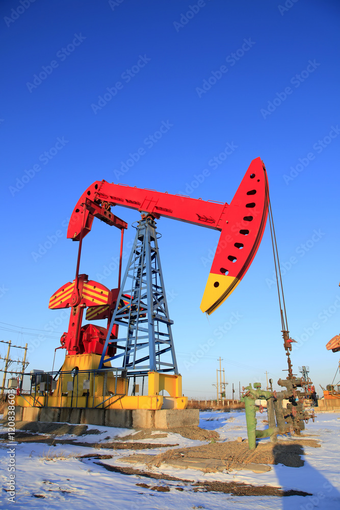 Oil field, oil pump in the work Oil field, oil pump in the work