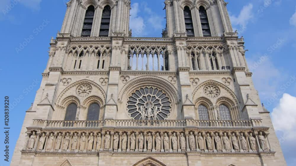 Paris july 01:famous landmark notre dame de paris tilt daylight church cathedral 4k uhd Paris july 01:famous landmark notre dame de paris tilt daylight church cathedral 4k uhd
