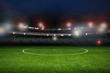 Stickers Stadion Leeg stadion met groen voetbalveld  © phonlamaiphoto