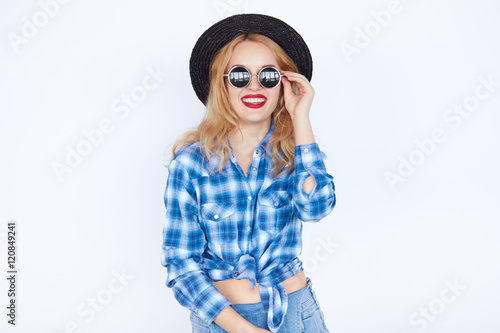 Lovely young blond woman in suglasses,