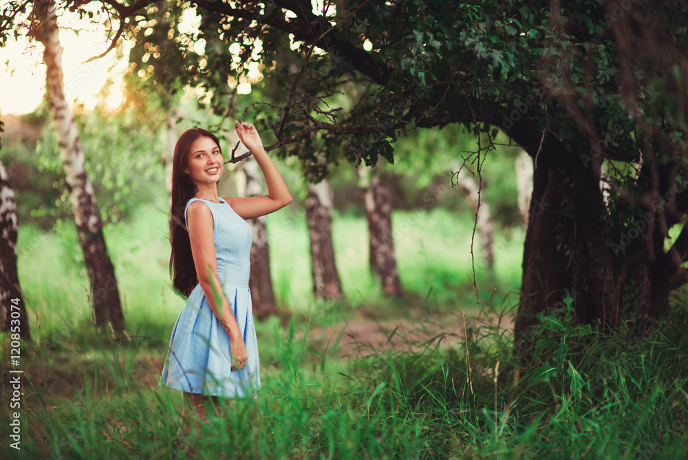 Portrait of pretty girl near the tree in the park. Concept of youth and natural beauty. soft focus Portrait of pretty girl near the tree in the park. Concept of youth and natural beauty. soft focus