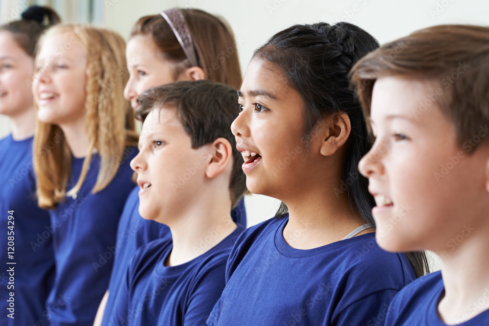 Group Of School Children Singing In Choir Together Group Of School Children Singing In Choir Together