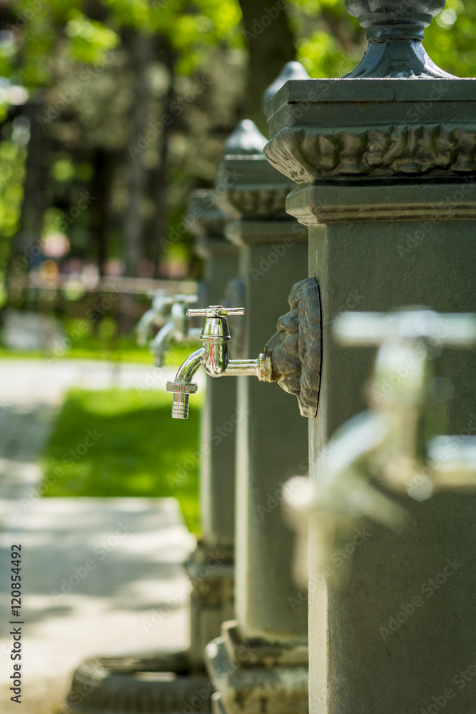 Water taps outside in a park Water taps outside in a park
