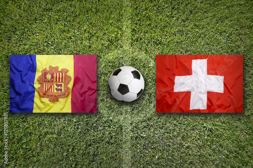 Andorra vs. Switzerland flags on soccer field