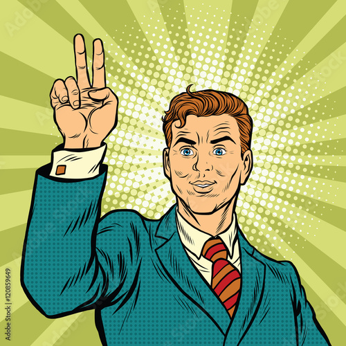 Male fingers of a hand shows the number two, victory