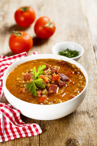 Tomato soup with lentils and sausages
