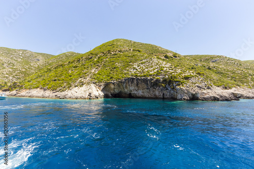 Fototapeta Naklejka Na Ścianę i Meble -  Cruise around Zakynthos, views from the sea on the island, Greece, background.