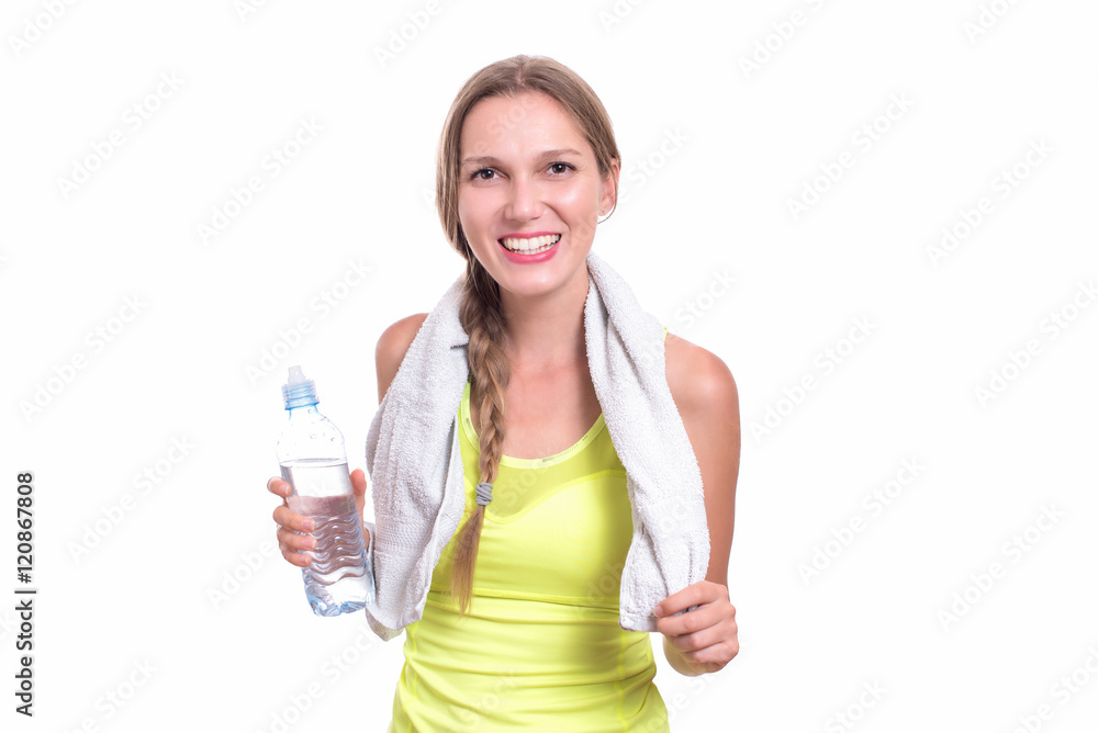 Young gym woman with water bottle smiling isolated on white Young gym woman with water bottle smiling isolated on white