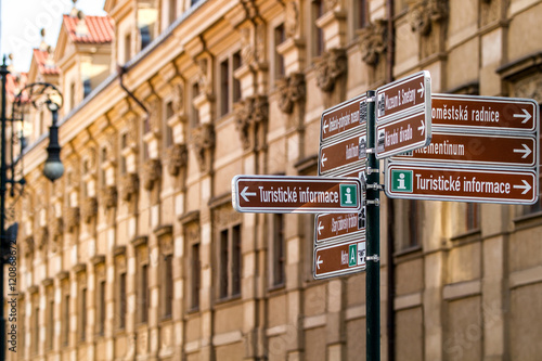 Information street sign in Prague.on blurred  background. Czech Republic.