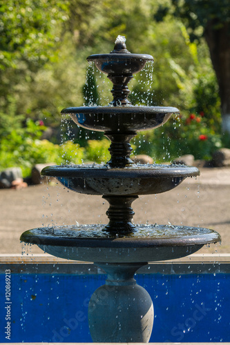 Four tiered fountain in the garden