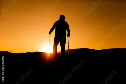 sunset trekking shooting silhoutte © mehmetcan