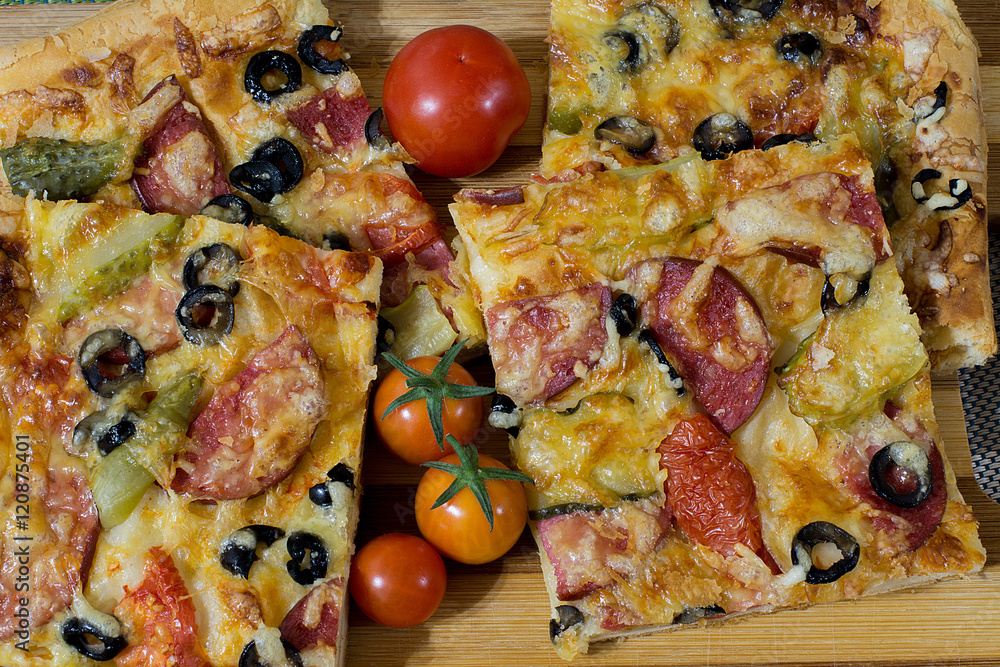 pizza with sausage, olives, tomatoes and cheese pizza with sausage, olives, tomatoes and cheese