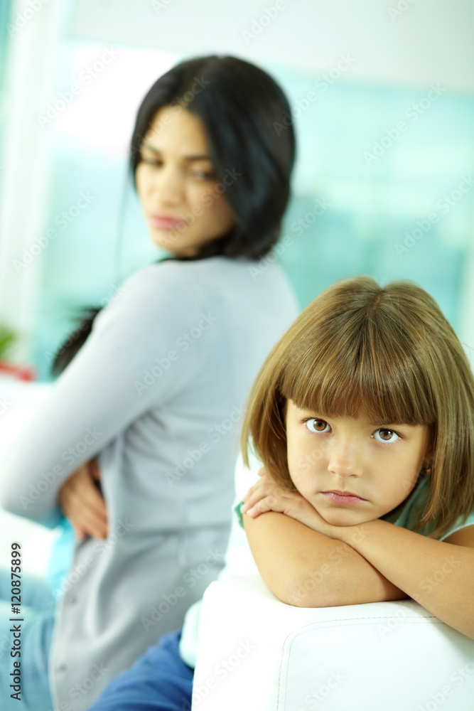 Little girl pouting at her mother Little girl pouting at her mother