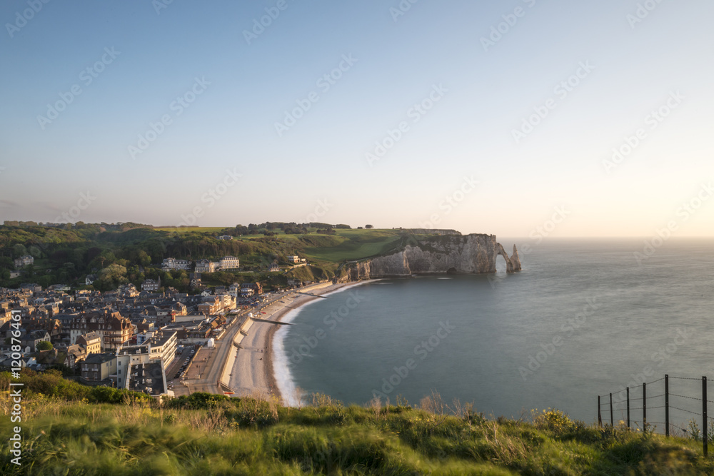 Scenic view of the famous cliffs of Etretat in Normandy at sunset, France
