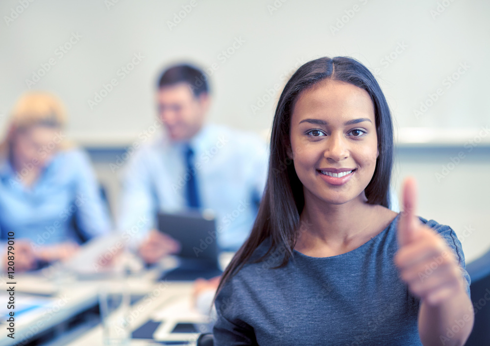 group of smiling businesspeople meeting in office group of smiling businesspeople meeting in office