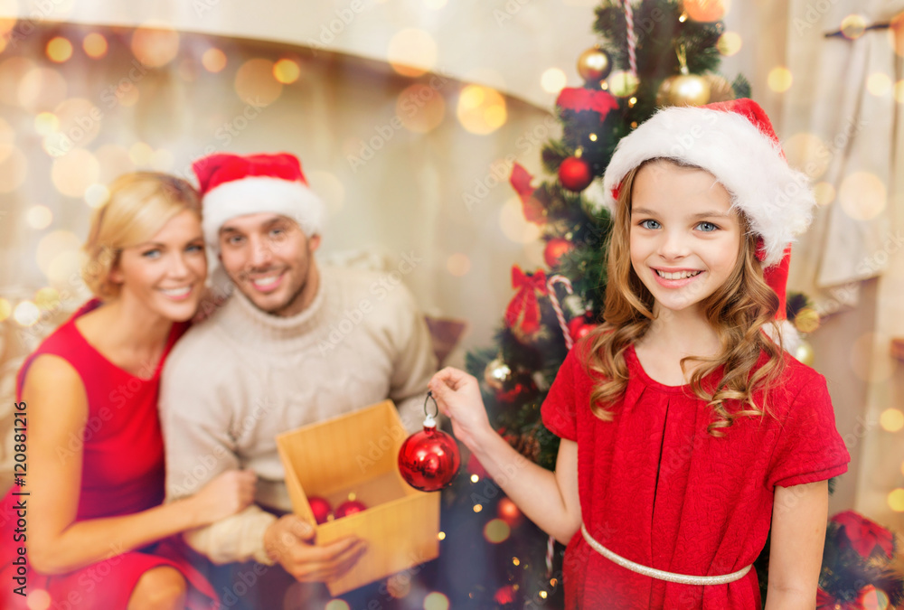 smiling family decorating christmas tree smiling family decorating christmas tree