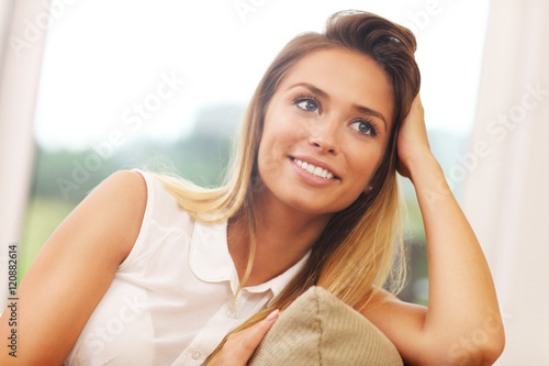 Woman on couch in living room