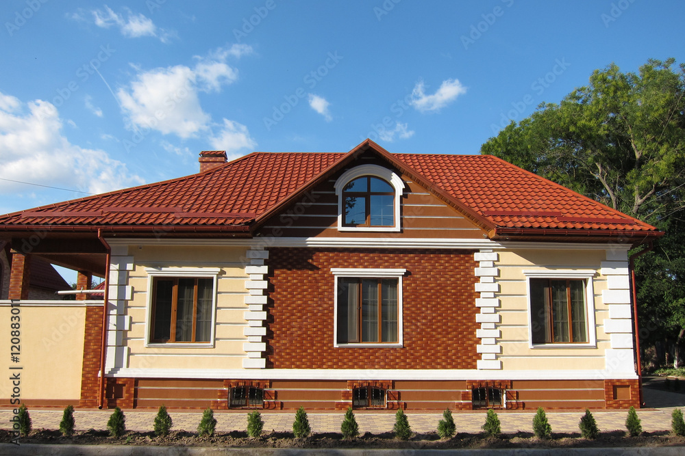 Red brick house with red roof
