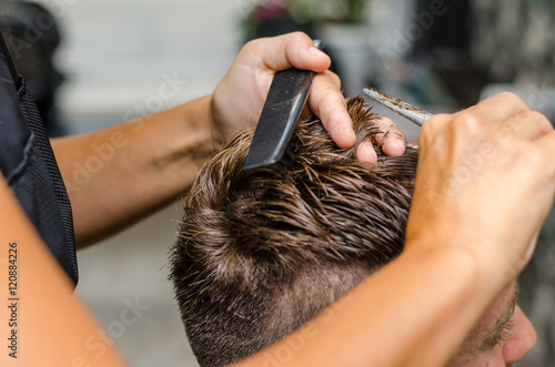 men's hair cutting scissors in a beauty salon © Ivan Dragiev