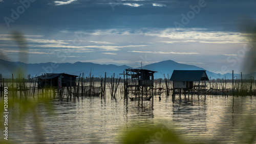 Traditional fishermen wooden houses in Songkhla Lake, Thailand © kaipungyai