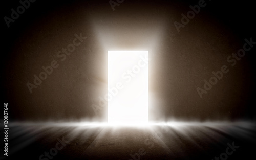 Glowing exit from dark room