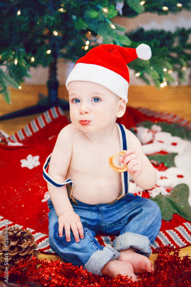 Lifestyle portrait of happy funny white Caucasian baby boy in