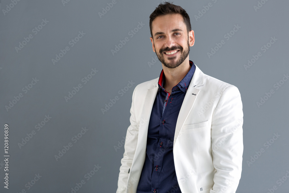 Elegant smiling male model posing Elegant smiling male model posing