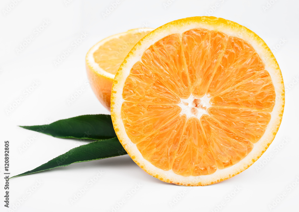 Fototapeta premium Fresh juicy oranges with leafs. on white background