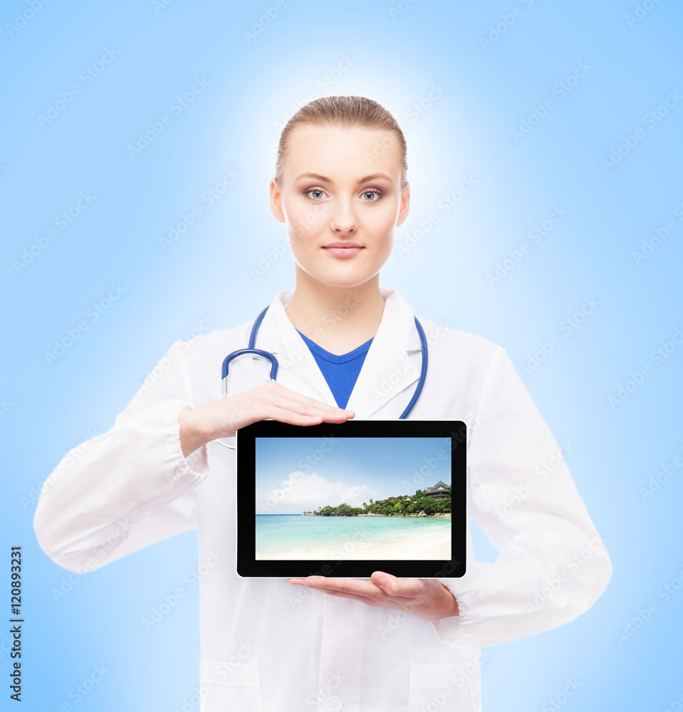 Young female doctor holding a tablet Young female doctor holding a tablet