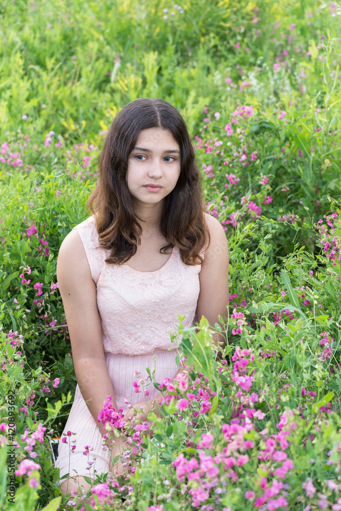 Portrait of sad teen girl on nature summer Portrait of sad teen girl on nature summer