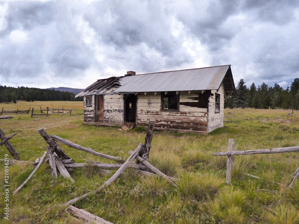 Storm Brewing Over Native American Cabin Storm Brewing Over Native American Cabin