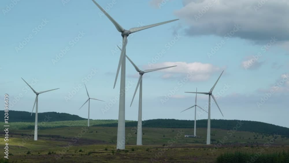 The big windmills turning around in the area along with the turning propellers The big windmills turning around in the area along with the turning propellers