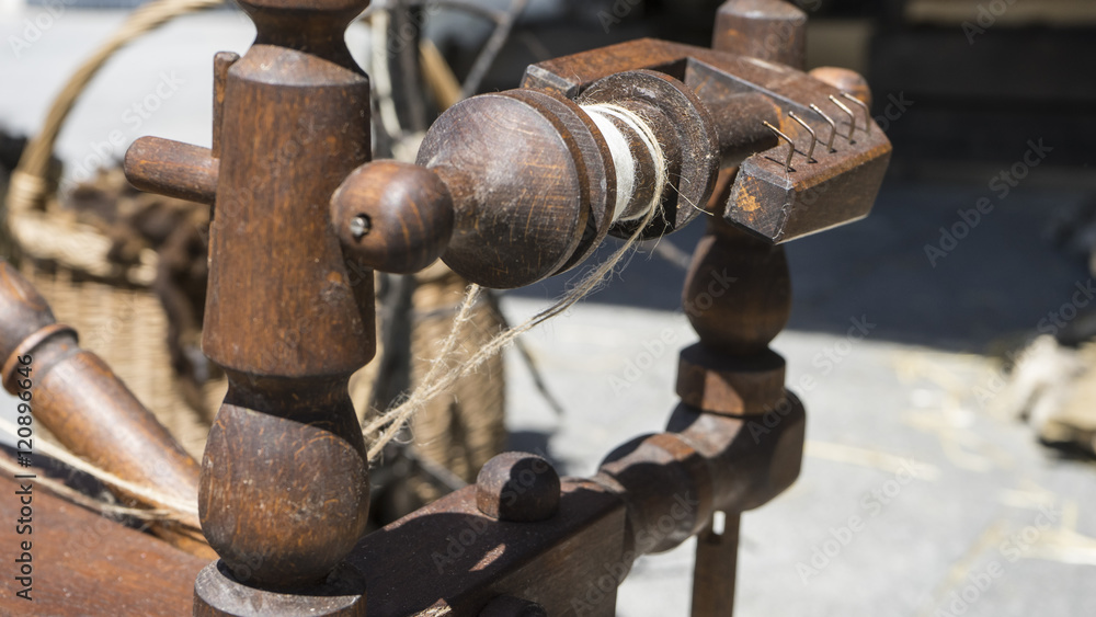 Antique, traditional spinning wheel for wool yarn, craft ancient