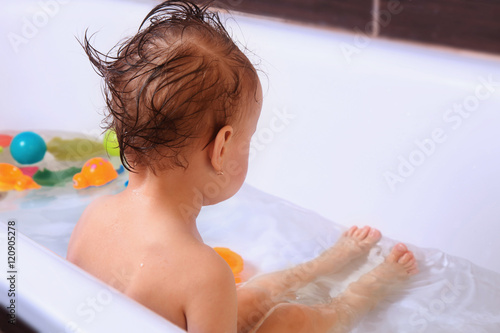 Beautiful baby girl in the bath