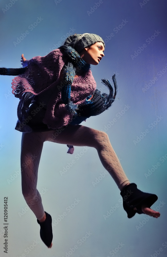 woman jump with colorful bacground - concept