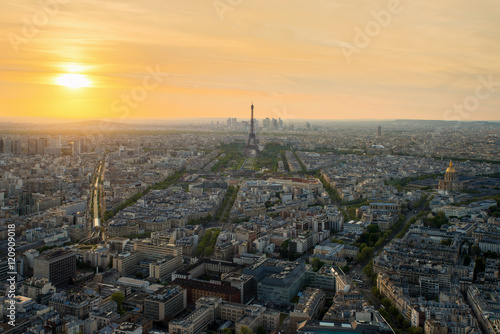 Aerial view of Paris with Eiffel tower at sunset in Paris France