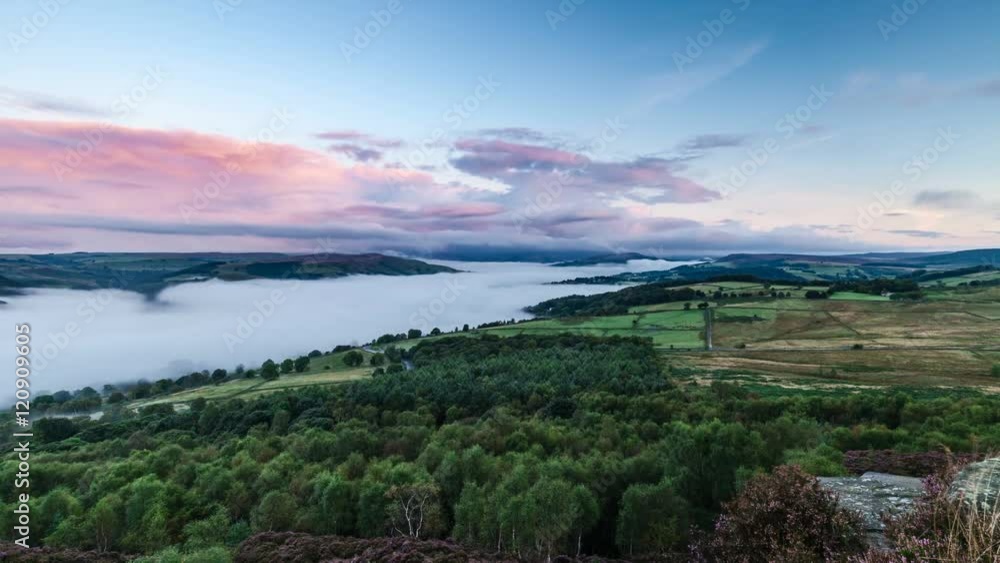 Time Lapse of Morning Mist over Moorland and Dynamic Colorful Sunrise Clouds in Peak District National Park Time Lapse of Morning Mist over Moorland and Dynamic Colorful Sunrise Clouds in Peak District National Park